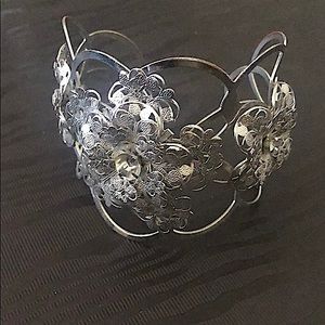 Silver toned Cuff bracelet with intricate metal floral details